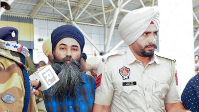 Waris Punjab De chief Amritpal Singh's close aide Papalpreet Singh being taken to Dibrugarh central jail on Tuesday. (ANI Photo)