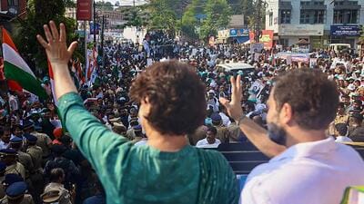 Wayanad: Congress leaders Rahul Gandhi and Priyanka Gandhi wave at supporters during a roadshow in Wayanad on Tuesday (PTI) Wayanad: Congress leaders Rahul Gandhi and Priyanka Gandhi wave at supporters during a roadshow in Wayanad on Tuesday (PTI)