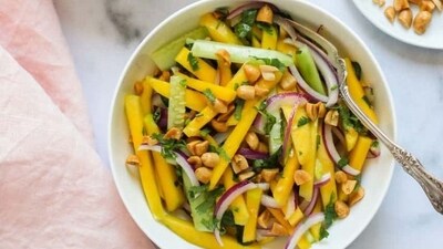 Mango Salad: To make this delicious salad, cut fresh mangoes into small pieces and mix them with chopped cucumber, red onion, and cilantro. Squeeze in some lime juice, drizzle honey, and add a pinch of salt and black pepper to taste. Toss it well and let it chill for a few minutes in the refrigerator. Serve the mango salad chilled and enjoy the sweet and tangy flavors in every bite. (Pinterest) Mango Salad: To make this delicious salad, cut fresh mangoes into small pieces and mix them with chopped cucumber, red onion, and cilantro. Squeeze in some lime juice, drizzle honey, and add a pinch of salt and black pepper to taste. Toss it well and let it chill for a few minutes in the refrigerator. Serve the mango salad chilled and enjoy the sweet and tangy flavors in every bite. (Pinterest)