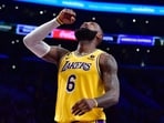 Los Angeles Lakers forward LeBron James (6) celebrates the victory against the Minnesota Timberwolves following overtime at Crypto.com Arena.