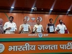 BJP leaders Dharmendra Pradhan and Mansukh Mandaviya release the party's first list of 189 candidates for the Karnataka assembly polls on Tuesday. (PTI) BJP leaders Dharmendra Pradhan and Mansukh Mandaviya release the party's first list of 189 candidates for the Karnataka assembly polls on Tuesday. (PTI)