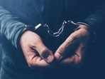Man held for making hoax threat calls.