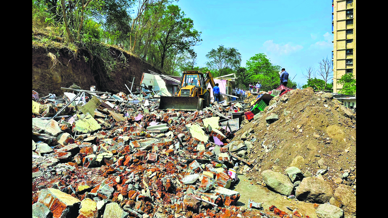 TMC, tehsildars raze 40 illegal constructions on collector’s land ...