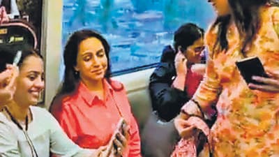 **EDS: SCREENSHOT FROM TWITTER VIDEO VIA @dreamgirlhema** Mumbai: Veteran actor and BJP MP Hema Malini rides a metro, in Mumbai, Tuesday, April 11, 2023. (PTI Photo)(PTI04_12_2023_000265A) (PTI) **EDS: SCREENSHOT FROM TWITTER VIDEO VIA @dreamgirlhema** Mumbai: Veteran actor and BJP MP Hema Malini rides a metro, in Mumbai, Tuesday, April 11, 2023. (PTI Photo)(PTI04_12_2023_000265A) (PTI)