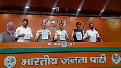 BJP leaders Dharmendra Pradhan and Mansukh Mandaviya release the party's first list of 189 candidates for the Karnataka assembly polls on Tuesday. (PTI) (HT_PRINT) BJP leaders Dharmendra Pradhan and Mansukh Mandaviya release the party's first list of 189 candidates for the Karnataka assembly polls on Tuesday. (PTI) (HT_PRINT)