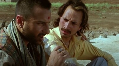 Saif Ali Khan and Deepak Dobriyal in a still from Omkara.