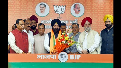 Former Shiromani Akali Dal (SAD) MLA Inder Iqbal Singh Atwal had joined Bharatiya Janata Party (BJP) in the presence of Union Minister of Housing and Urban Affairs Hardeep Singh Puri, party National General Secretary Tarun Chugh, party leader Vijay Rupani and others, at the party headquarters, in New Delhi on April 9. (ANI) Former Shiromani Akali Dal (SAD) MLA Inder Iqbal Singh Atwal had joined Bharatiya Janata Party (BJP) in the presence of Union Minister of Housing and Urban Affairs Hardeep Singh Puri, party National General Secretary Tarun Chugh, party leader Vijay Rupani and others, at the party headquarters, in New Delhi on April 9. (ANI)