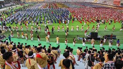 Over 11,000 folk dancers and drummers will perform the Bihu dance at Sarusajai Stadium in Guwahati, Assam on April 14 in an attempt to set a Guinness World Record. Rehearsals are taking place in full swing in the state ahead of the historical moment. (PTI) Over 11,000 folk dancers and drummers will perform the Bihu dance at Sarusajai Stadium in Guwahati, Assam on April 14 in an attempt to set a Guinness World Record. Rehearsals are taking place in full swing in the state ahead of the historical moment. (PTI)