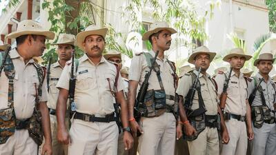 Railway Protection Special Force, Karnataka Special Reserve Police and local police personnel conduct a route march ahead of the Karnataka assembly elections in Bengaluru. (PTI) Railway Protection Special Force, Karnataka Special Reserve Police and local police personnel conduct a route march ahead of the Karnataka assembly elections in Bengaluru. (PTI)