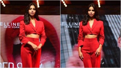 Suhana Khan wears a sizzling red blazer and pants for her first media meet. (HT Photo/Varinder Chawla)