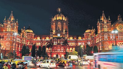 The Chhatrapati Shivaji Maharaj Terminus (CSMT) station is seen illuminated in orange on the eve of World Cancer Day to create awareness about the illness, in Mumbai on February 3, 2023. (Photo by SUJIT JAISWAL / AFP) (AFP) The Chhatrapati Shivaji Maharaj Terminus (CSMT) station is seen illuminated in orange on the eve of World Cancer Day to create awareness about the illness, in Mumbai on February 3, 2023. (Photo by SUJIT JAISWAL / AFP) (AFP)