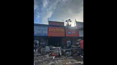 The fire, suspected to have erupted due to a short-circuit, engulfed the eatery, Pav Bhaji Express, within minutes, causing loss worth over ₹2 lakh. (HT Photo) The fire, suspected to have erupted due to a short-circuit, engulfed the eatery, Pav Bhaji Express, within minutes, causing loss worth over ₹2 lakh. (HT Photo)