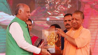 Uttar Pradesh chief minister Yogi Adityanath receiving a memento from BJP MLA Ashutosh Tandon on the occasion of Lalji Tandon’s birth anniversary in Lucknow on Wednesday. (HT Photo) Uttar Pradesh chief minister Yogi Adityanath receiving a memento from BJP MLA Ashutosh Tandon on the occasion of Lalji Tandon’s birth anniversary in Lucknow on Wednesday. (HT Photo)