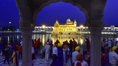 Amritsar, Punjab: Amritsar is the spiritual capital of the Sikh religion and is the best place to celebrate Baisakhi in India. The Golden Temple is beautifully decorated during this festival and is a sight to behold. The city also hosts a massive Baisakhi procession that attracts thousands of devotees every year. (HT Photo/Sameer Sehgal)