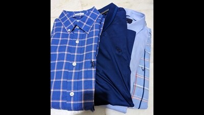 Man returned with more blue shirts and t-shirts, despite his wife’s request. (Twitter/@divya_sharmaMD) Man returned with more blue shirts and t-shirts, despite his wife’s request. (Twitter/@divya_sharmaMD)