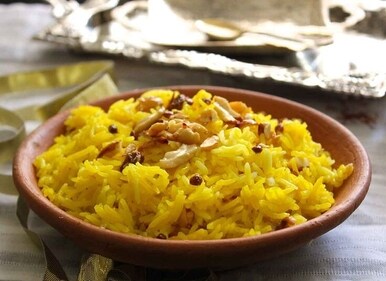 It is a traditional dish during Baisakhi made with rice cooked in saffron and sugar, along with rich dry fruits. (Pinterest) It is a traditional dish during Baisakhi made with rice cooked in saffron and sugar, along with rich dry fruits. (Pinterest)