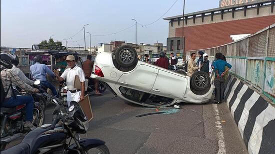 Speeding car turned over on Lakkar Bridge in Ludhiana. (HT File Photo)
