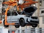 A BMW SUV moves down the assembly line at the BMW manufacturing plant.