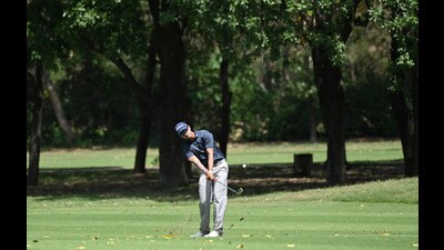 A golfer playing a shot during the PGTI Golf Tournament at Chandigarh Golf Club in Chandigarh. (Ravi Kumar/HT)