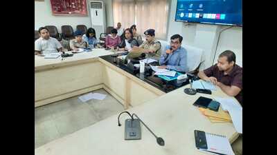 Aligarh district administration officials holding a press conference. (HT photo)
