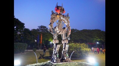 An 18-foot-tall sculpture of Modulor Man by Le Corbusier, a sculpture of an outdoor metals lighting tower, a sculpture of a stone family, robotic sculptures, among others, have been set up at the park. (HT Photo)