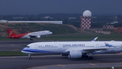 A Shenzhen airline flight is seen taking off at Taiwan Taoyuan International Airport in Taoyuan, Taiwan on Wednesday. (REUTERS)