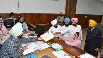 Congress candidate Karamjit Kaur Chaudhary filing her nomination papers on Thursday for the Jalandhar Lok Sabha byelection as party leaders (from left) Charanjit Singh Channi, Partap Singh Bajwa, Amarinder Singh Raja Warring and Navjot Singh Sidhu look on. (HT Photo) Congress candidate Karamjit Kaur Chaudhary filing her nomination papers on Thursday for the Jalandhar Lok Sabha byelection as party leaders (from left) Charanjit Singh Channi, Partap Singh Bajwa, Amarinder Singh Raja Warring and Navjot Singh Sidhu look on. (HT Photo)