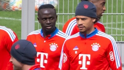 Bayern Munich's Sadio Mane, center left, and Leroy Sane, center right, attend a training session (AP) Bayern Munich's Sadio Mane, center left, and Leroy Sane, center right, attend a training session (AP)