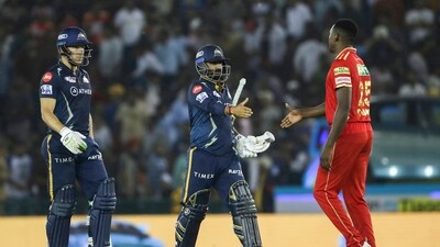 Rahul Tewatia hit a four to take Gujarat Titans to finish off their chase and complete a victory that had been set up by a resurgent Mohit Sharma and a half century from Shubman Gill. (AP) Rahul Tewatia hit a four to take Gujarat Titans to finish off their chase and complete a victory that had been set up by a resurgent Mohit Sharma and a half century from Shubman Gill. (AP)