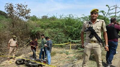 Jhansi: Police personnel at the site of the encounter in which jailed mafia Atiq Ahmad's son Asad was killed by the UP STF, in Jhansi. (PTI)