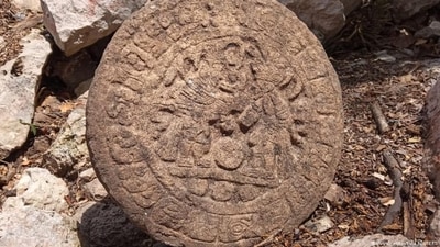 Archaeologists have discovered a stone showing Mayan hieroglyphs. (INAH/Handout via REUTERS) Archaeologists have discovered a stone showing Mayan hieroglyphs. (INAH/Handout via REUTERS)