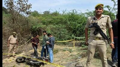 Police personnel at the site of the encounter in which jailed mafia Atiq Ahmad’s son Asad was killed by the UP STF, in Jhansi, Thursday. (PTI Photo) Police personnel at the site of the encounter in which jailed mafia Atiq Ahmad’s son Asad was killed by the UP STF, in Jhansi, Thursday. (PTI Photo)