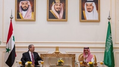 Saudi Foreign Minister Prince Faisal bin Farhan bin Abdullah meets with Syrian Minister of Foreign Affairs and Expatriates Faisal Mekdad in Jeddah, Saudi Arabia, April 12, 2023. (Reuters)