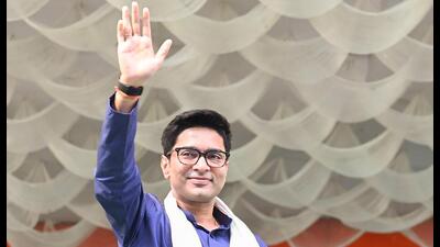 TMC general secretary Abhishek Banerjee waves at supporters during a public meeting in Alipurduar. (PTI) TMC general secretary Abhishek Banerjee waves at supporters during a public meeting in Alipurduar. (PTI)