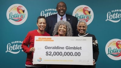 Geraldine Gimblet holding a giant lottery cheque at the Florida headquarters. (Twitter/@floridalottery) Geraldine Gimblet holding a giant lottery cheque at the Florida headquarters. (Twitter/@floridalottery)