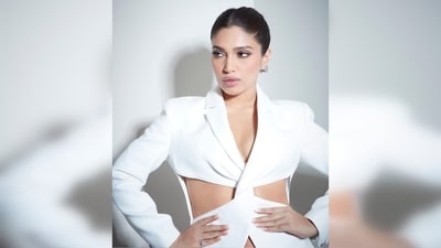 Bhumi Pednekar's suit comes with a twisted cut-out tailored jacket and straight-cut trousers. (Instagram/@bhumipednekar) Bhumi Pednekar's suit comes with a twisted cut-out tailored jacket and straight-cut trousers. (Instagram/@bhumipednekar)