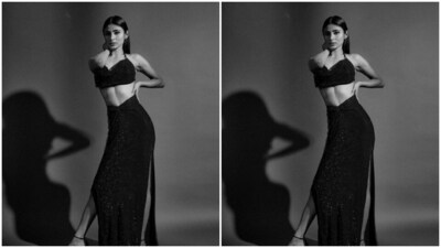 Mouni looked every bit gorgeous in a black sequined bralette with a cowl neckline and backless details. Showing off her midriff, Mouni further teamed it with a matching long bodycon skirt with gathered details at the waist and thigh high slits at the sides. (Instagram/@imouniroy) Mouni looked every bit gorgeous in a black sequined bralette with a cowl neckline and backless details. Showing off her midriff, Mouni further teamed it with a matching long bodycon skirt with gathered details at the waist and thigh high slits at the sides. (Instagram/@imouniroy)