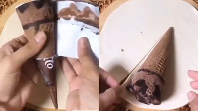 Woman making paratha with ice cream cone filling. (Twitter/@MFuturewala) Woman making paratha with ice cream cone filling. (Twitter/@MFuturewala)