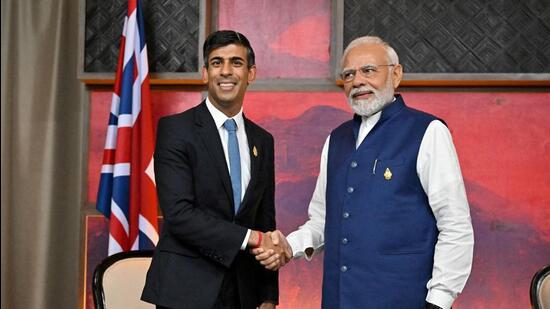 British Prime Minister Rishi Sunak and India's Prime Minister Narendra Modi hold a bilateral meeting on November 16, 2022 in Nusa Dua, Indonesia. (REUTERS)