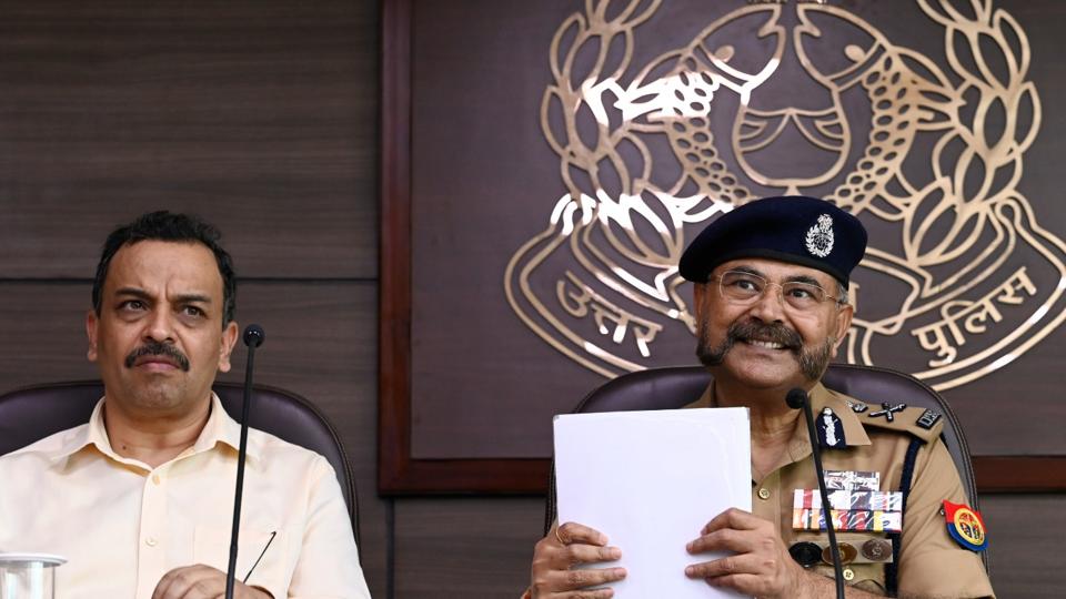ADG STF Amitabh Yash (left) and Special DG (Law and Order) Prashant Kumar (right) at a briefing on the encounter of Atiq Ahmad’s son Asad and a shooter Ghulam, at police headquarters in Lucknow on Thursday. (HT Photo/DEEPAK GUPTA)