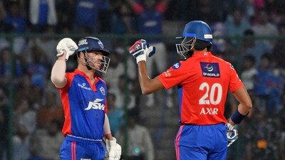 New Delhi, Apr 11 (ANI): Delhi Capitals' Captain David Warner and teammate Axar Patel fist bump each other during the match against Mumbai Indians in the Indian Premier League (IPL) 2023, at Arun Jaitley Stadium, in New Delhi on Tuesday. (ANI Photo/ Rahul Singh) (Rahul Singh)