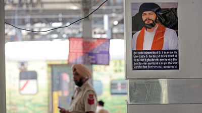 'Waris Punjab De' Chief Amritpal Singh's poster put up by Punjab Police at the Amritsar Railway Station, stating that a suitable reward would be given to anyone who tells about his whereabouts and his name would be kept confidential, in Amritsar on Thursday. (ANI) 'Waris Punjab De' Chief Amritpal Singh's poster put up by Punjab Police at the Amritsar Railway Station, stating that a suitable reward would be given to anyone who tells about his whereabouts and his name would be kept confidential, in Amritsar on Thursday. (ANI)