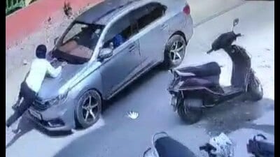 Car drags on-duty traffic cop for 1km in Ludhiana, two booked Car drags on-duty traffic cop for 1km in Ludhiana, two booked