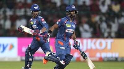 Lucknow Super Giants' Nicholas Pooran, right, and Ayush Badoni run between the wickets to score during the Indian Premier League cricket match between Royal Challengers Bangalore and Lucknow Super Giants in Bengaluru, India, Monday, April 10, 2023. (AP Photo/Aijaz Rahi) (AP) Lucknow Super Giants' Nicholas Pooran, right, and Ayush Badoni run between the wickets to score during the Indian Premier League cricket match between Royal Challengers Bangalore and Lucknow Super Giants in Bengaluru, India, Monday, April 10, 2023. (AP Photo/Aijaz Rahi) (AP)