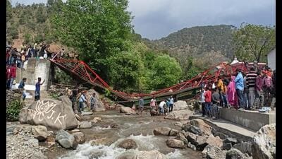 Rescue operations going on after a footbridge collapsed during Baisakhi celebration in Udhampur’s Chenani block on Friday. (HT Photo)