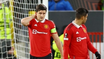 Soccer Football - Europa League - Quarter Final - First Leg - Manchester United v Sevilla - Old Trafford, Manchester, Britain - April 13, 2023  Manchester United's Harry Maguire reacts after scoring an own goal and Sevilla's second REUTERS/Carl Recine (REUTERS)