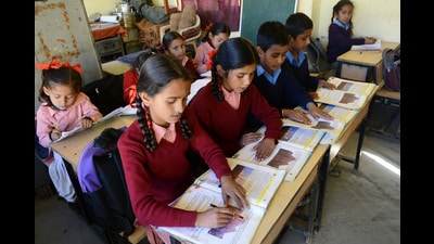 Shimla, Himachal Pradesh, India December 15: Students reading books in government school at Moolkoti village in Shimla district with story, Shimla on Thursday, December 15 2016. HT File Photo Shimla, Himachal Pradesh, India December 15: Students reading books in government school at Moolkoti village in Shimla district with story, Shimla on Thursday, December 15 2016. HT File Photo