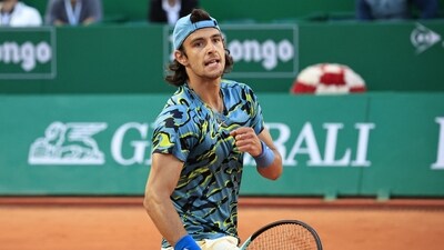 Italy's Lorenzo Musetti reacts during his match against Serbia's Novak Djokovic at the Monte-Carlo ATP Masters Series tournament round of 16 in Monte Carlo on April 13, 2023. (Photo by Valery HACHE / AFP) (AFP) Italy's Lorenzo Musetti reacts during his match against Serbia's Novak Djokovic at the Monte-Carlo ATP Masters Series tournament round of 16 in Monte Carlo on April 13, 2023. (Photo by Valery HACHE / AFP) (AFP)