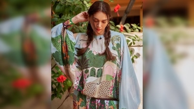 Aditi Rao Hydari was seen sporting an old-school look with two middle-parted braids. This hairstyle is a classic style that has been popular for generations. To recreate this look, start by parting your hair down the middle and tightly braid each section. Secure them with a small band and pull them apart to add some texture. (Instagram/@aditiraohydari) Aditi Rao Hydari was seen sporting an old-school look with two middle-parted braids. This hairstyle is a classic style that has been popular for generations. To recreate this look, start by parting your hair down the middle and tightly braid each section. Secure them with a small band and pull them apart to add some texture. (Instagram/@aditiraohydari)