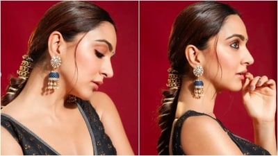 To achieve Kiara Advani's low ponytail with a golden fishtail braid, add movement to your hair with a curling iron and hairspray. Make a clean middle parting, tie a low ponytail, and accessorize it with a chunky chain or bracelet. Use a thin golden thread to add a golden effect to your fishtail braid, alternating it with bigger hair sections. Tug on the braid to loosen it, pull out some face-framing strands, and straighten them slightly. Voila! You're ready to slay. (Instagram/@kiaraaliaadvani) To achieve Kiara Advani's low ponytail with a golden fishtail braid, add movement to your hair with a curling iron and hairspray. Make a clean middle parting, tie a low ponytail, and accessorize it with a chunky chain or bracelet. Use a thin golden thread to add a golden effect to your fishtail braid, alternating it with bigger hair sections. Tug on the braid to loosen it, pull out some face-framing strands, and straighten them slightly. Voila! You're ready to slay. (Instagram/@kiaraaliaadvani)